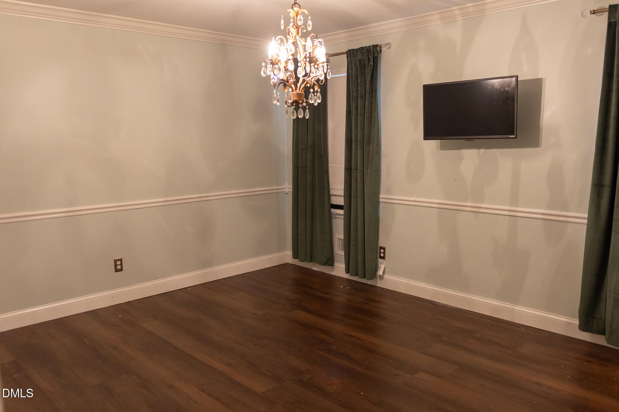 6708 Spencer Court Raleigh, NC 27615 - Photo 21 of 35 a view of a livingroom with wooden floor and a window