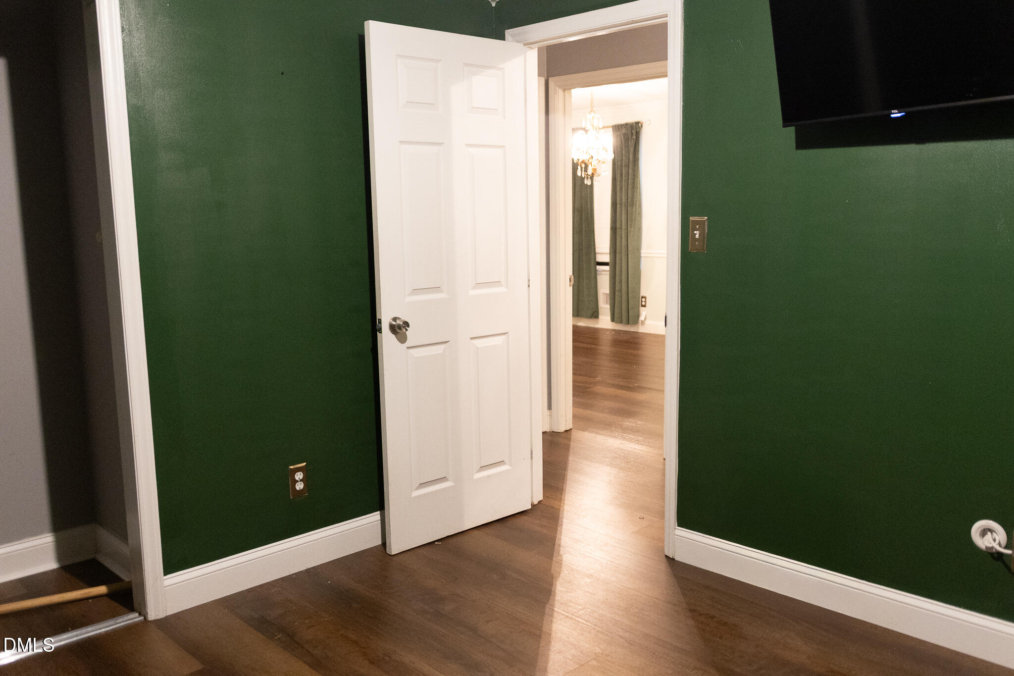6708 Spencer Court Raleigh, NC 27615 - Photo 26 of 35 an empty room with wooden floor and closet