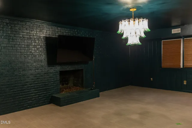 a bathroom with a shower and a toilet