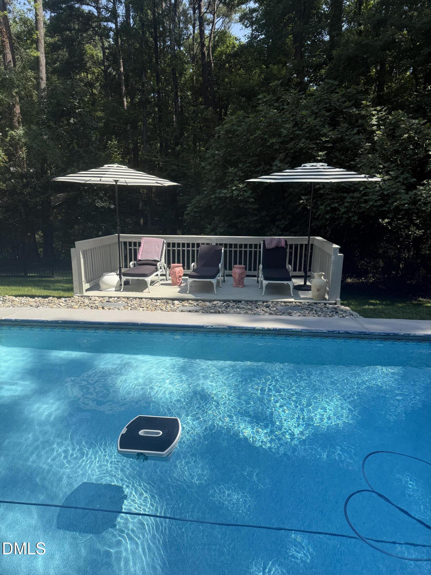 6708 Spencer Court Raleigh, NC 27615 - Photo 5 of 35 a view of house with outdoor space and sitting area