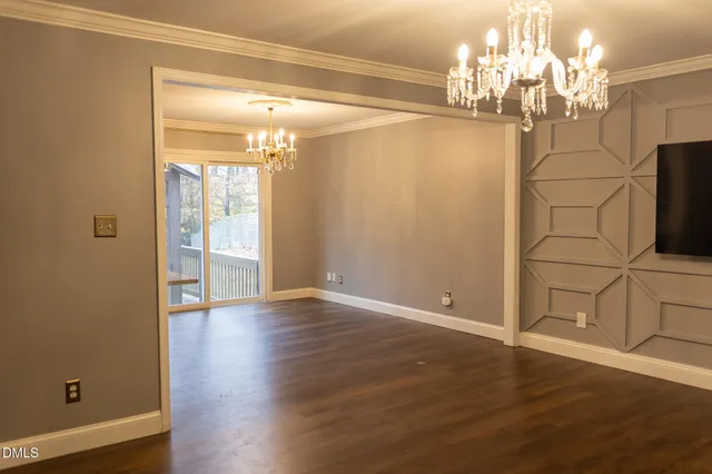 a view of a livingroom with wooden floor