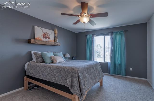 7868 Coffee Road Peyton, CO 80831 - Photo 15 of 27 Master Bedroom - Upper Level