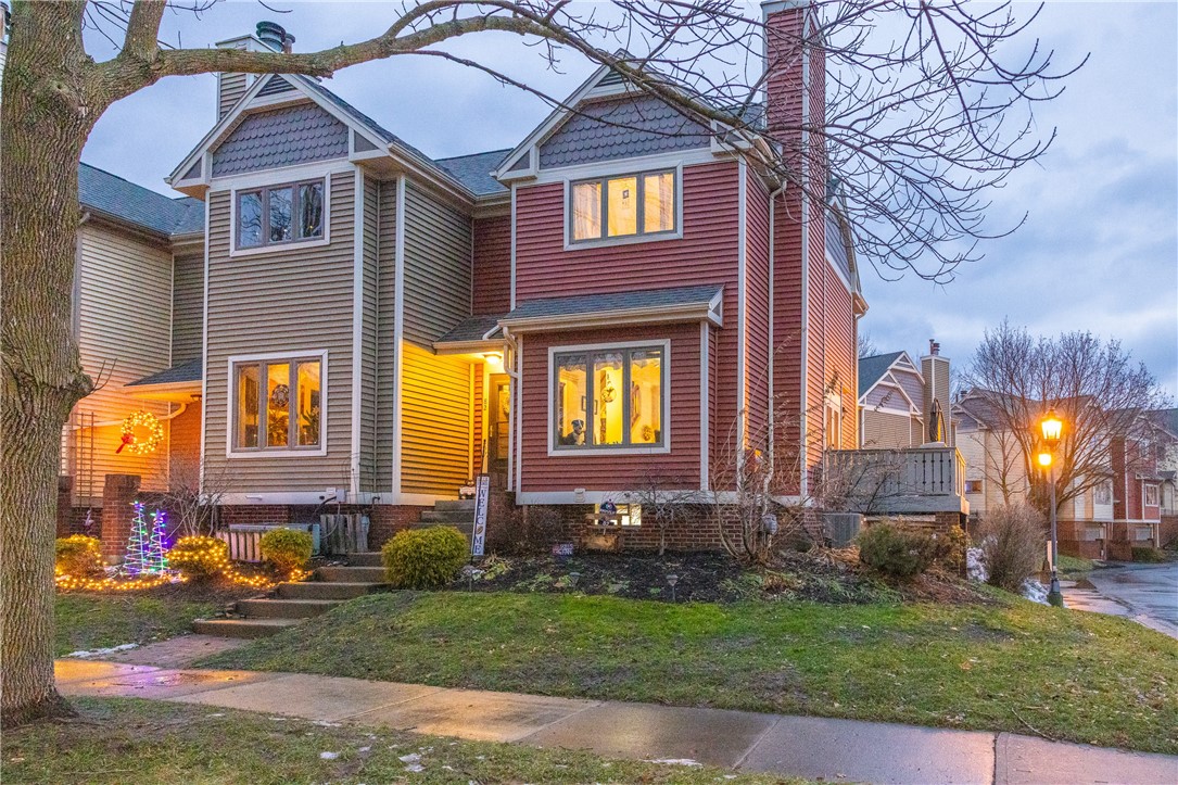82 Edinburgh Street Rochester, NY 14608 - Photo 1 of 1 Warm and Inviting End Unit