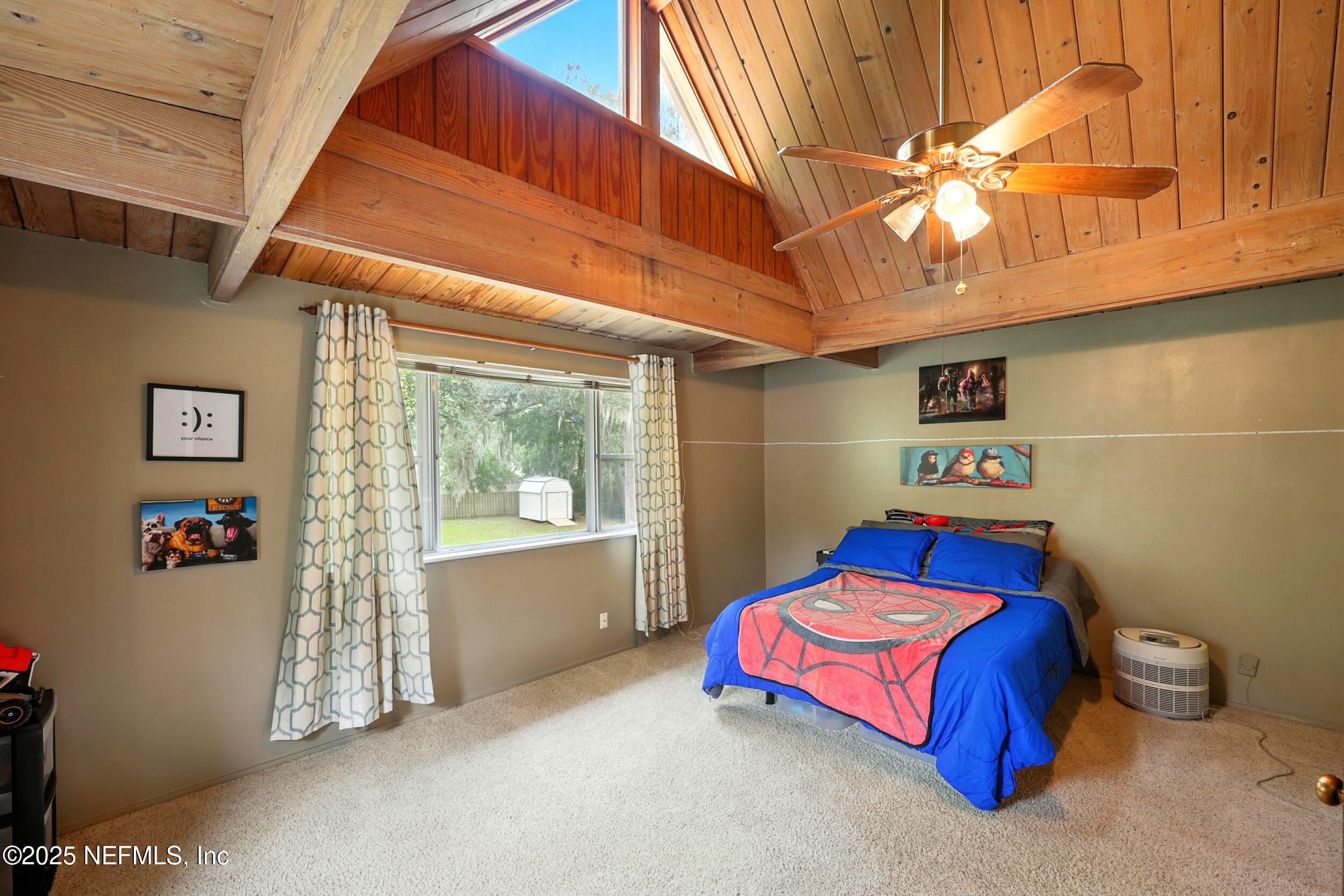 2712 Red Fox Road Orange Park, FL 32073 - Photo 22 of 30 a bedroom with a bed and a window