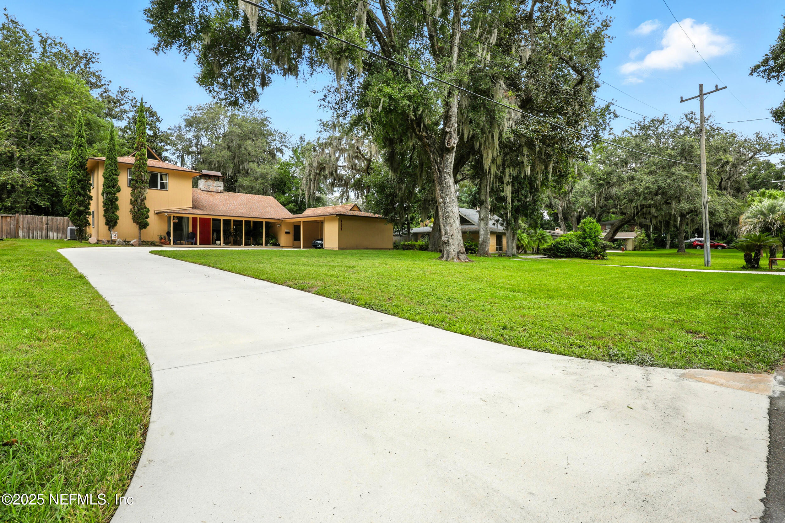 2712 Red Fox Road Orange Park, FL 32073 - Photo 29 of 30 a view of an outdoor space and a yard