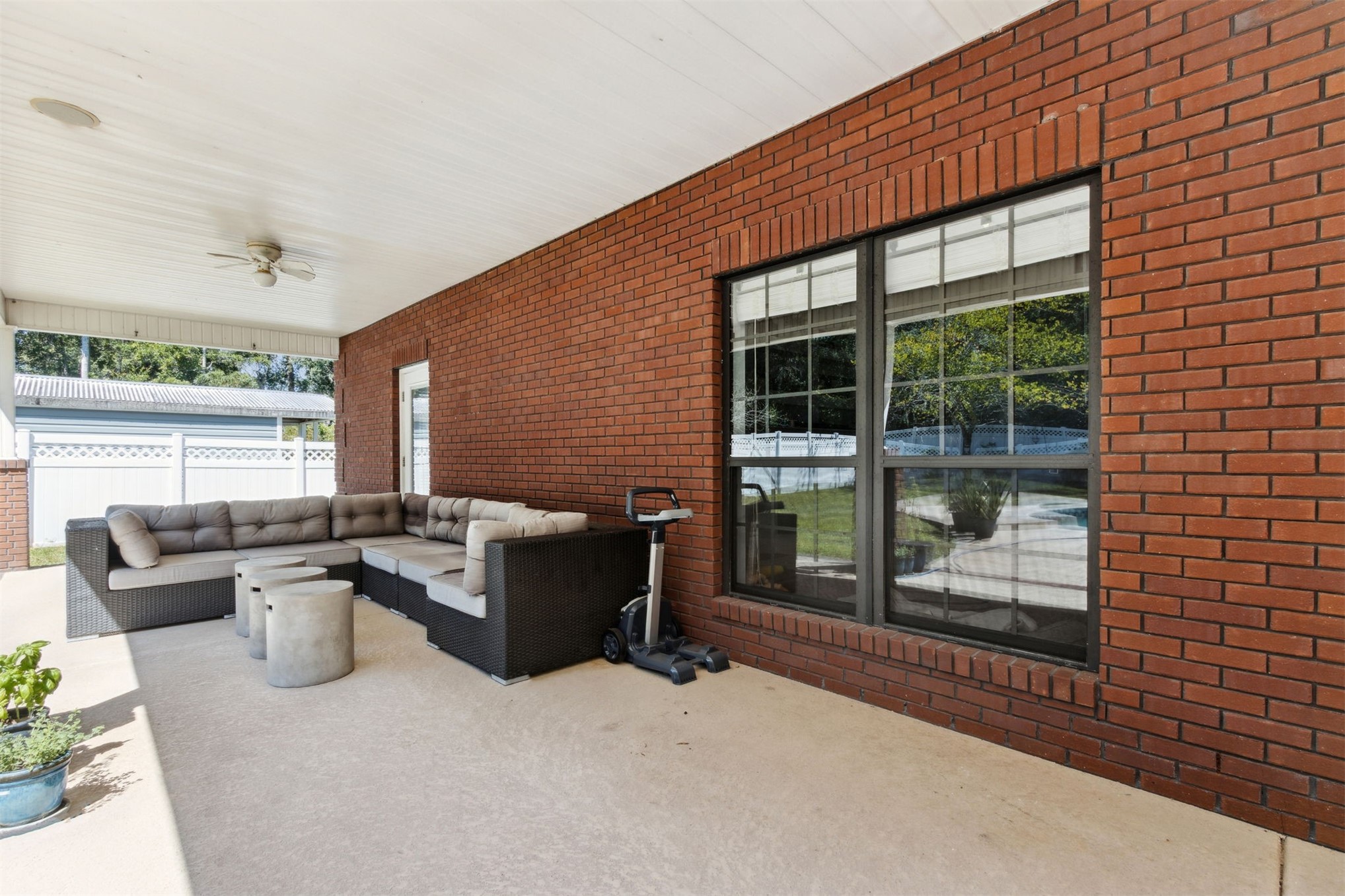 87377 Raddin Road Yulee, FL 32097 - Photo 63 of 75 a outdoor living space with furniture