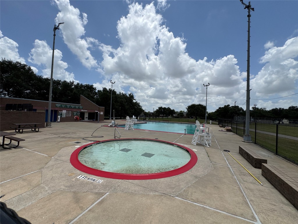 5510 Haight Street Houston, TX 77028 - Photo 26 of 26 a view of a swimming pool with a yard