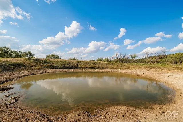 a view of a lake with a mountain