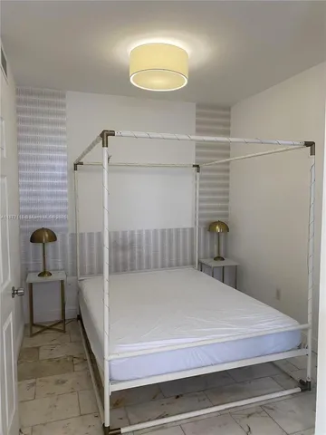 a bathroom with a sink and shower