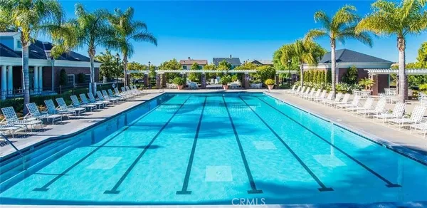 a view of swimming pool with a patio