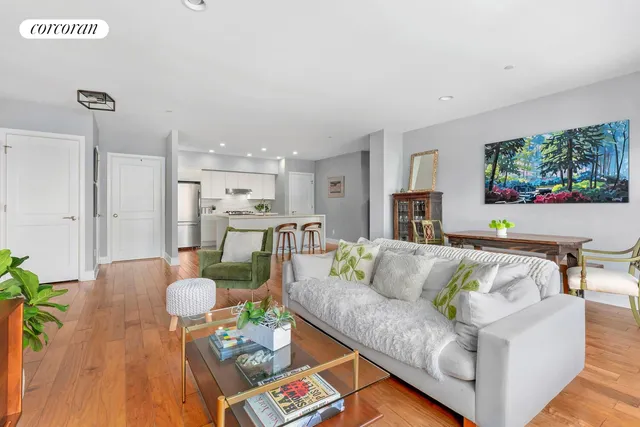 a view of kitchen with granite countertop cabinets table and chairs