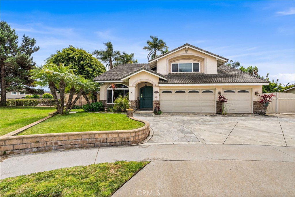 17481 Frans Lane Huntington Beach, CA 92649 - Photo 1 of 1 a front view of a house with a yard