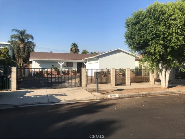 a view of a building with a street
