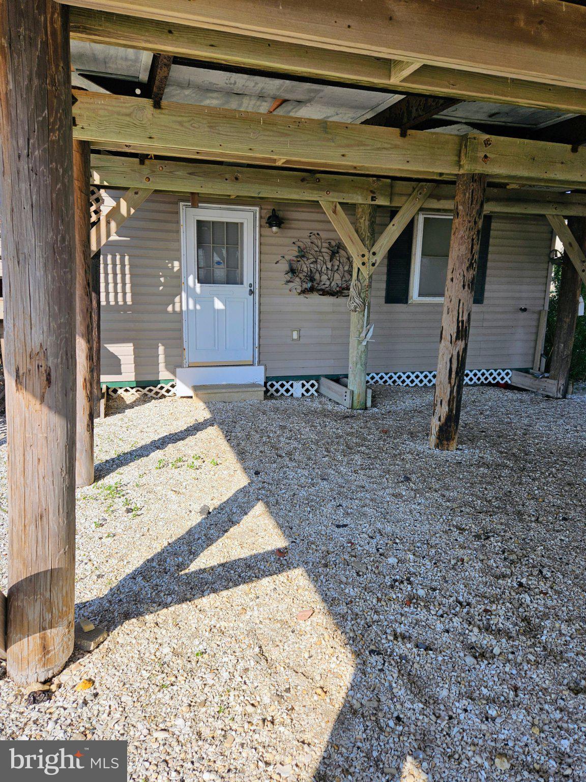167 Cove Road Newport, NJ 08345 - Photo 32 of 38 a view of a front door of the house