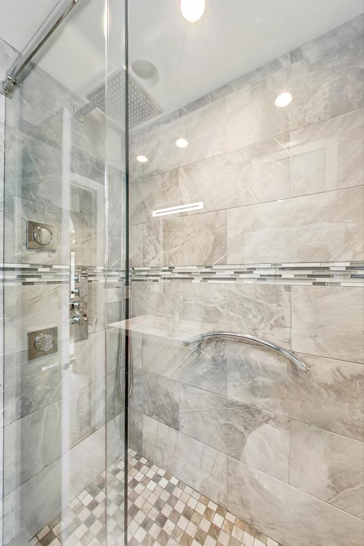 6322 West Huntington Street Chicago, IL 60646 - Photo 16 of 51 a bathroom with a shower