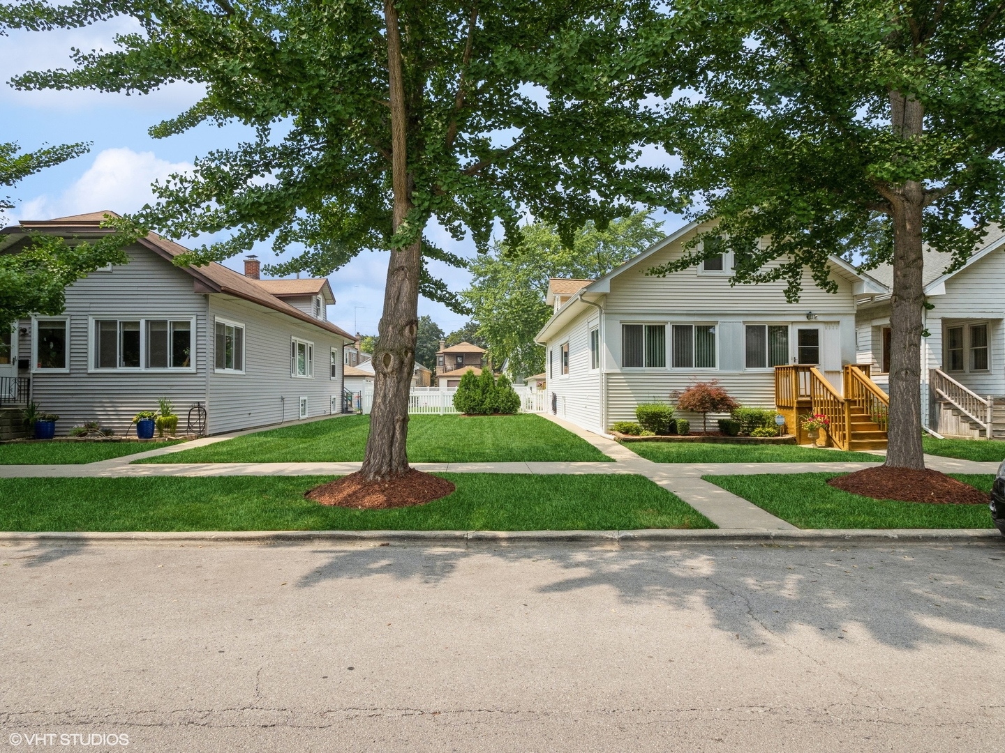 6322 West Huntington Street Chicago, IL 60646 - Photo 44 of 51 a front view of house with yard and green space