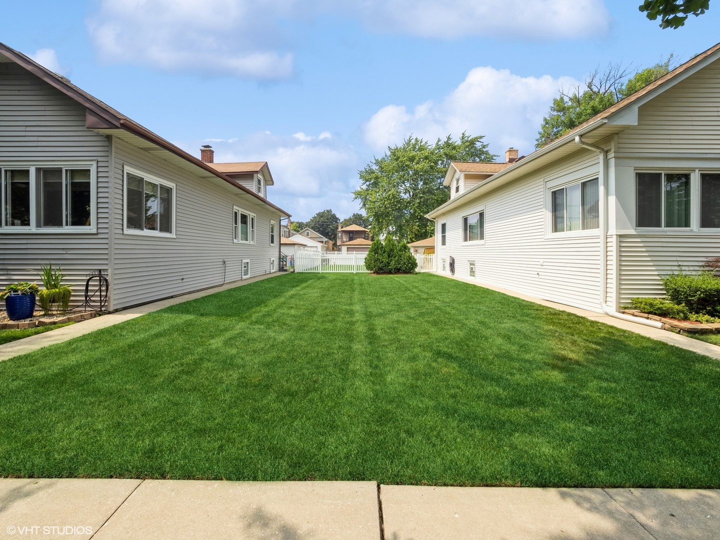 6322 West Huntington Street Chicago, IL 60646 - Photo 45 of 51 a view of an house with backyard space and garden