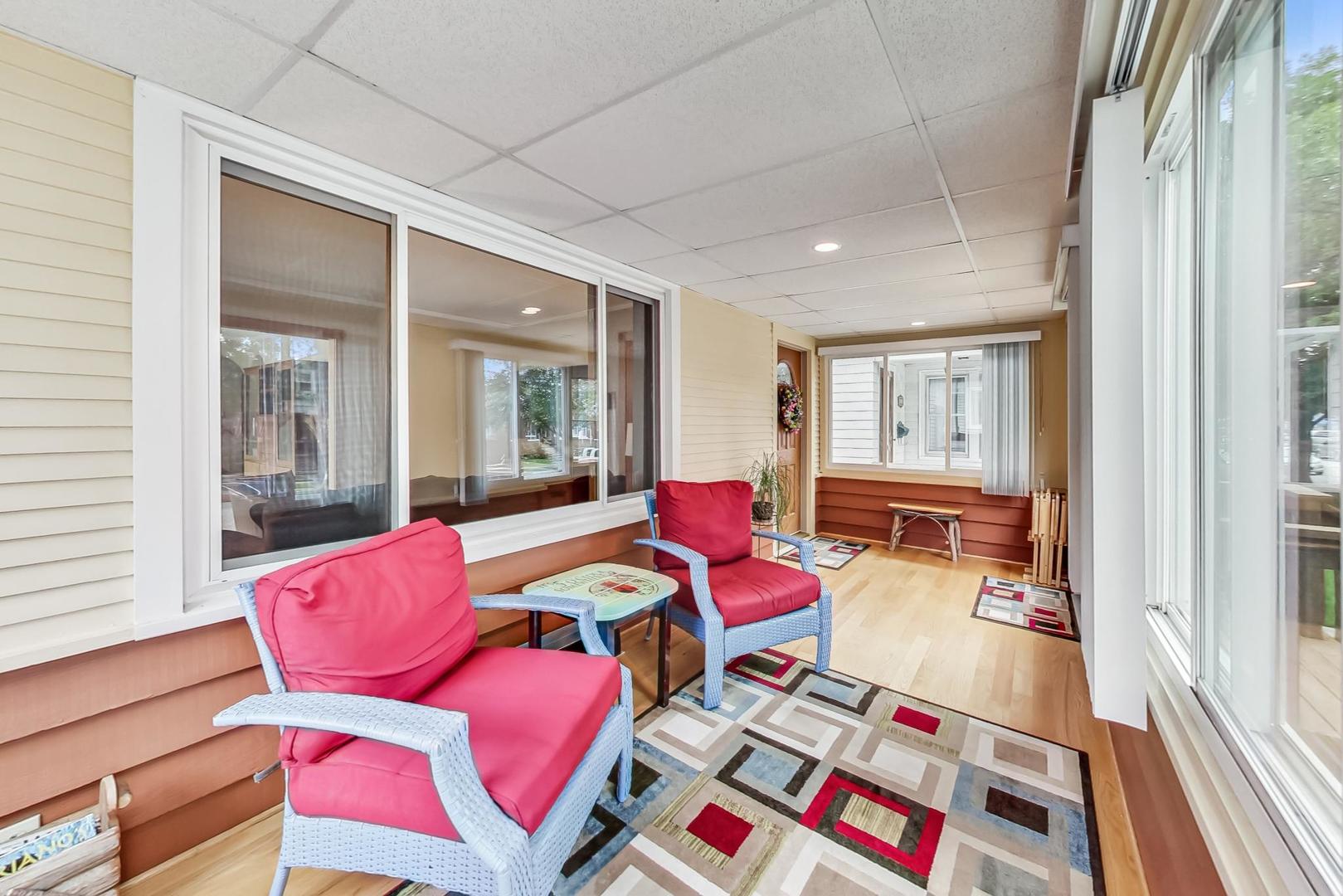 6322 West Huntington Street Chicago, IL 60646 - Photo 9 of 51 a living room with furniture and a window