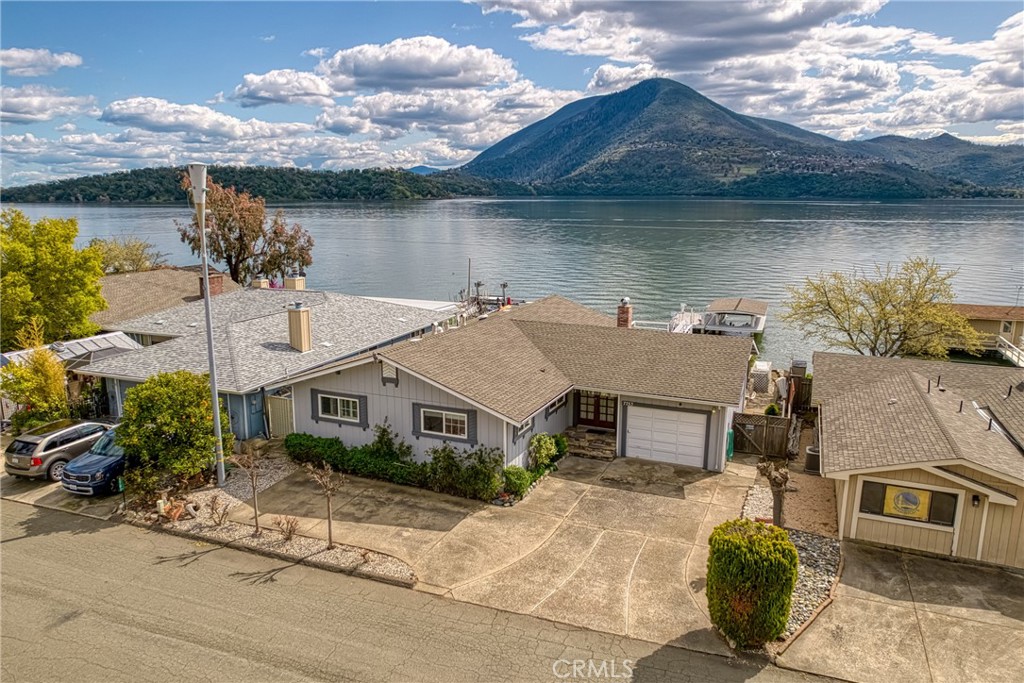 7753 Cora Drive Lucerne, CA 95458 - Photo 2 of 36 a aerial view of a house next to a yard