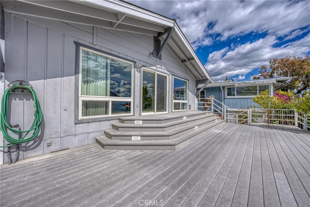 7753 Cora Drive Lucerne, CA 95458 - Photo 27 of 36 a view of house with wooden floor and outdoor seating