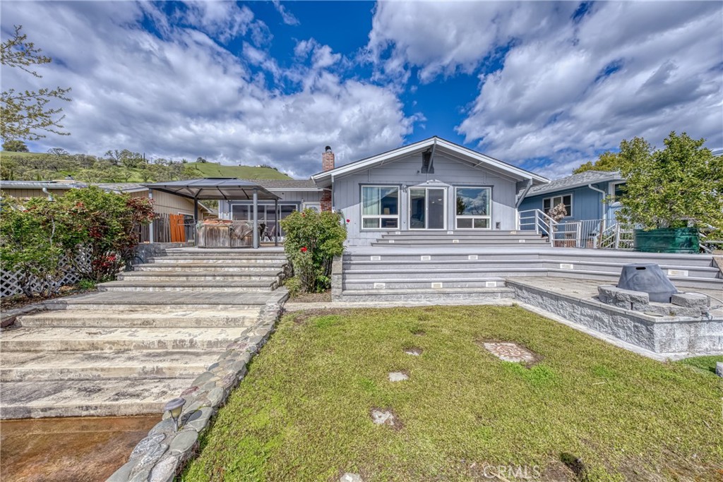 7753 Cora Drive Lucerne, CA 95458 - Photo 29 of 36 a view of house with a swimming pool
