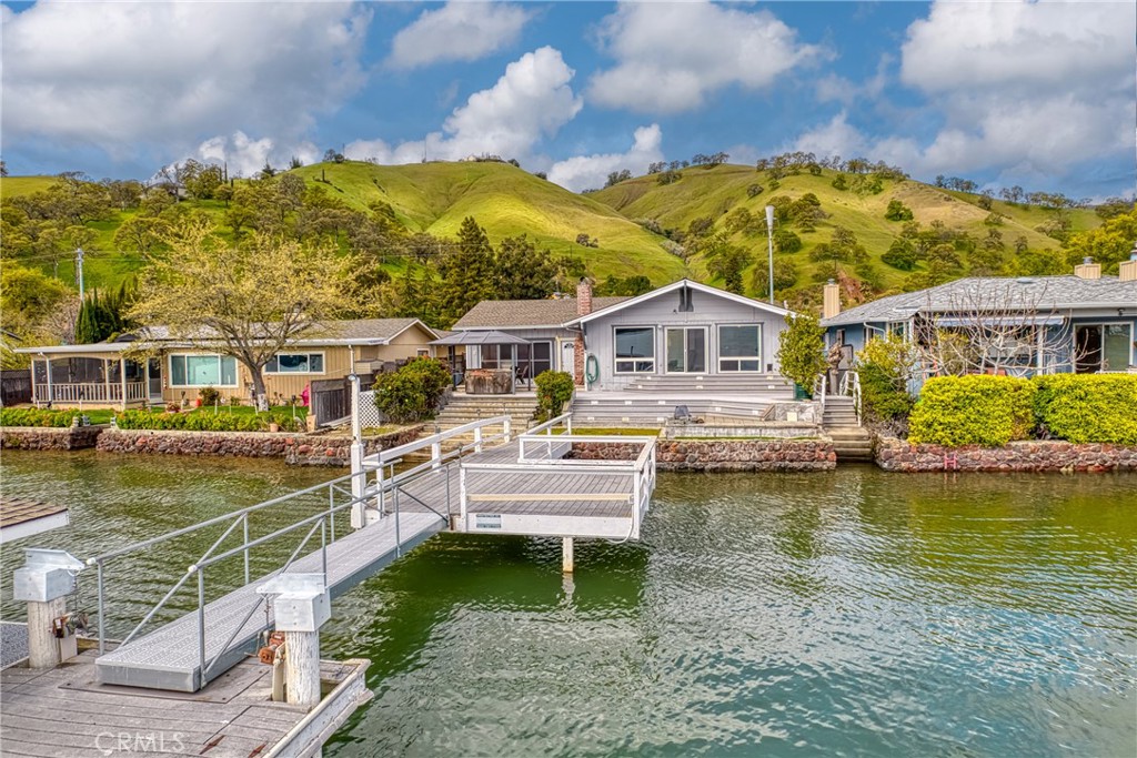 7753 Cora Drive Lucerne, CA 95458 - Photo 31 of 36 a house with swimming pool in front of it