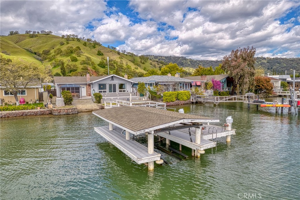 7753 Cora Drive Lucerne, CA 95458 - Photo 34 of 36 a view of a lake with houses
