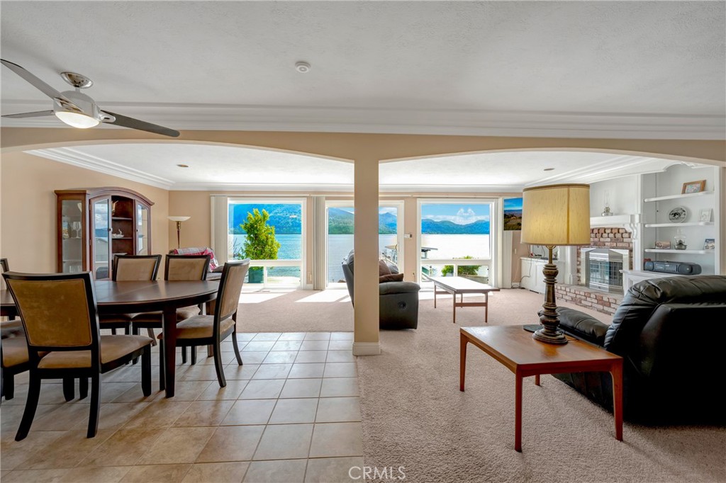 7753 Cora Drive Lucerne, CA 95458 - Photo 10 of 36 a living room with furniture and a large window