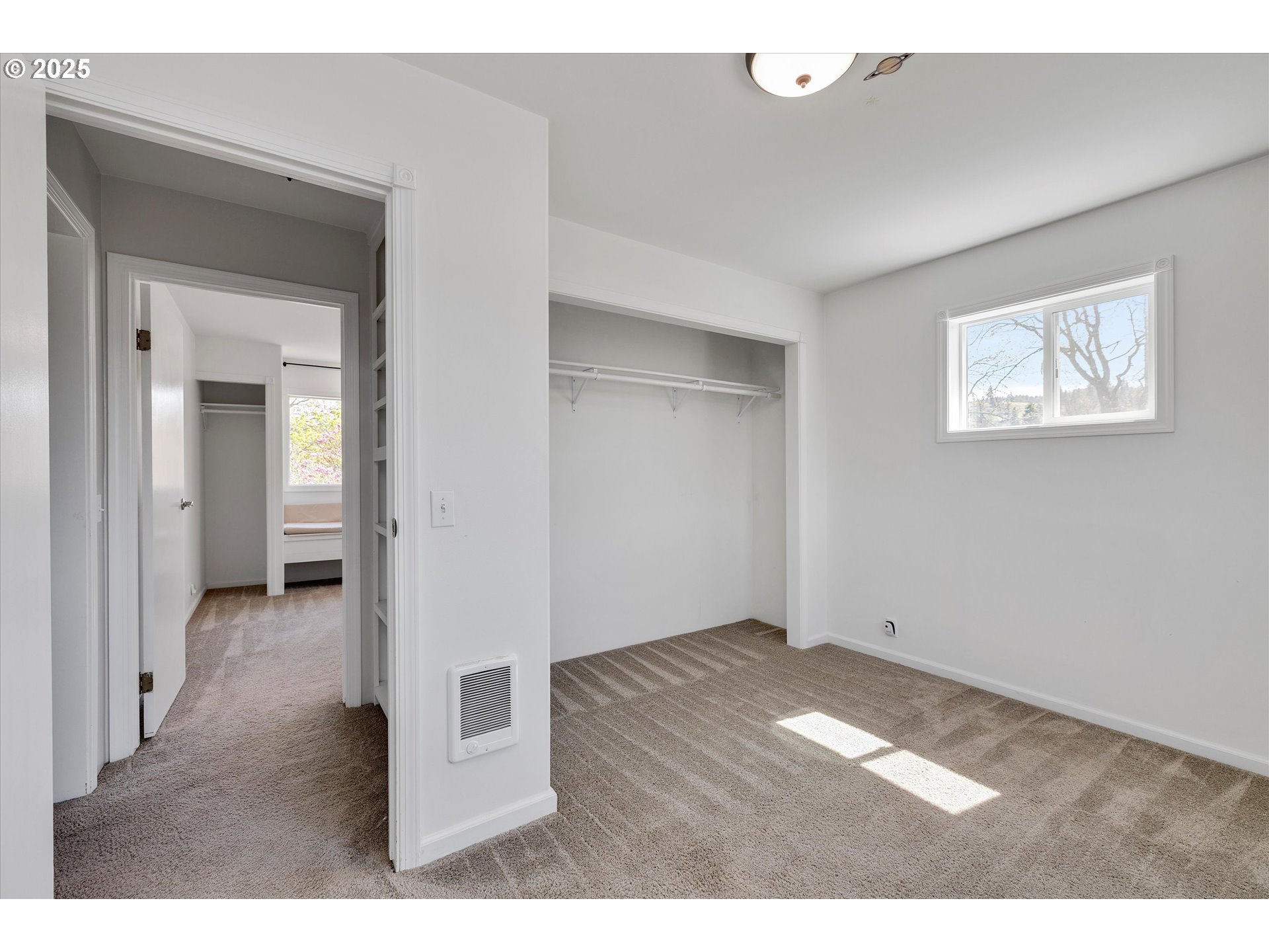 1805 Carroll Road Mosier, OR 97040 - Photo 24 of 45 a view of an empty room with wooden floor