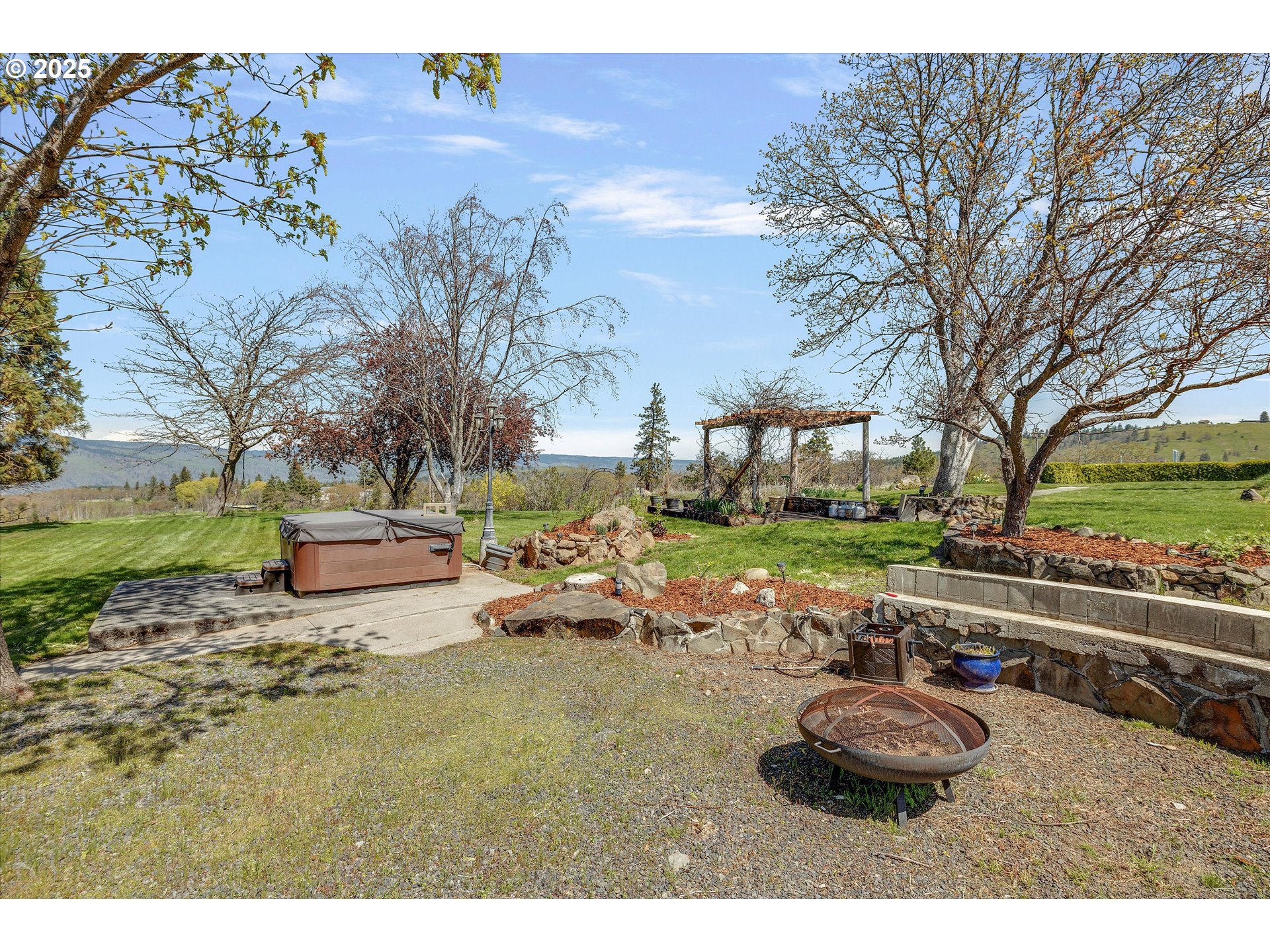 1805 Carroll Road Mosier, OR 97040 - Photo 5 of 45 a view of a backyard with table and chairs