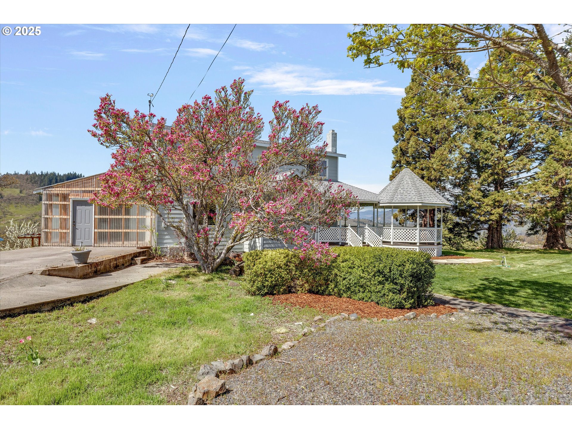 1805 Carroll Road Mosier, OR 97040 - Photo 8 of 45 a view of a house with a yard