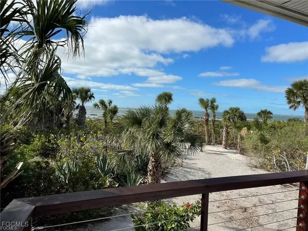 a view of swimming pool from a balcony