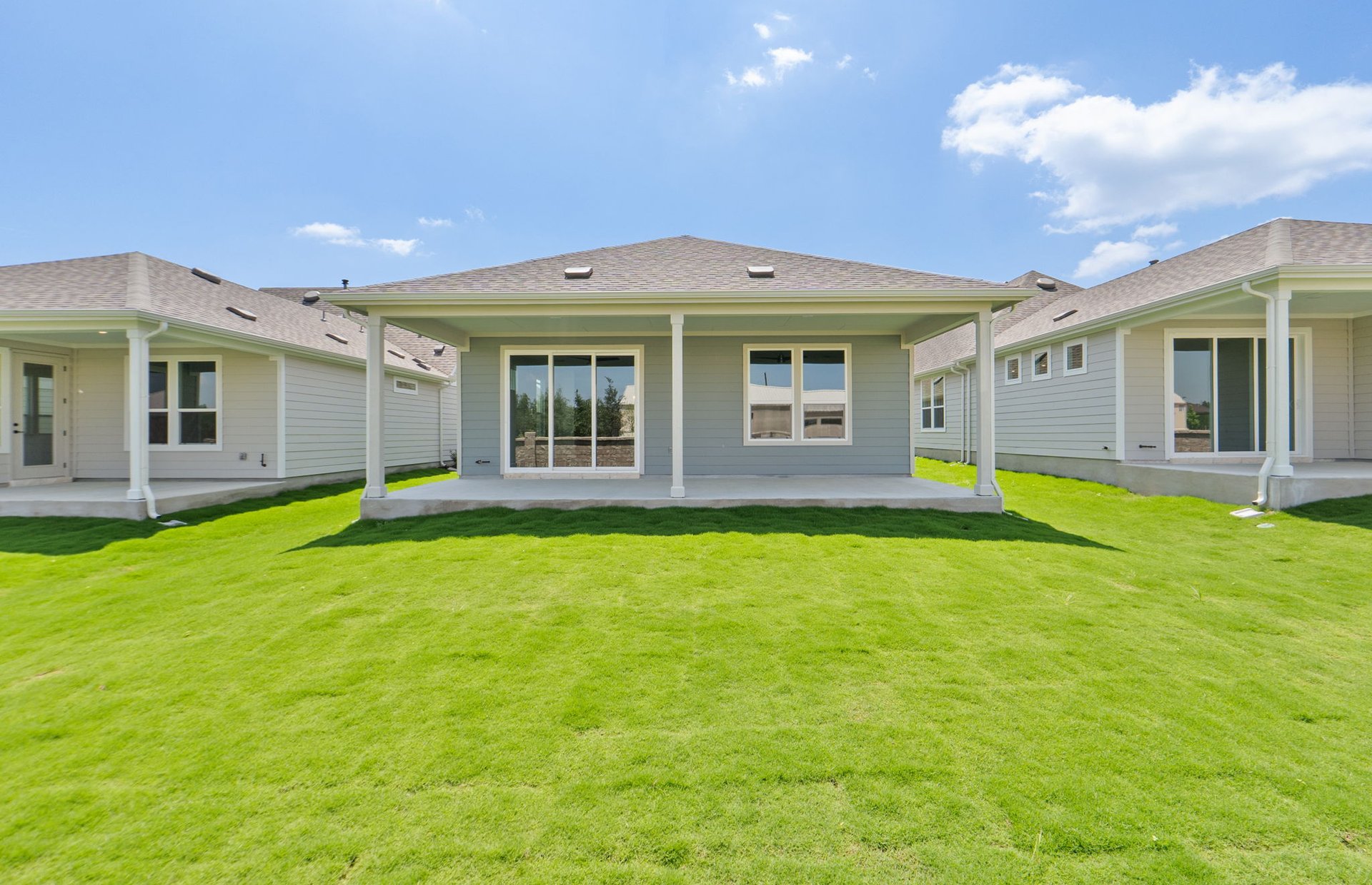 207 Smokestack Lane Georgetown, TX 78633 - Photo 17 of 21 a view of a house with a backyard and porch