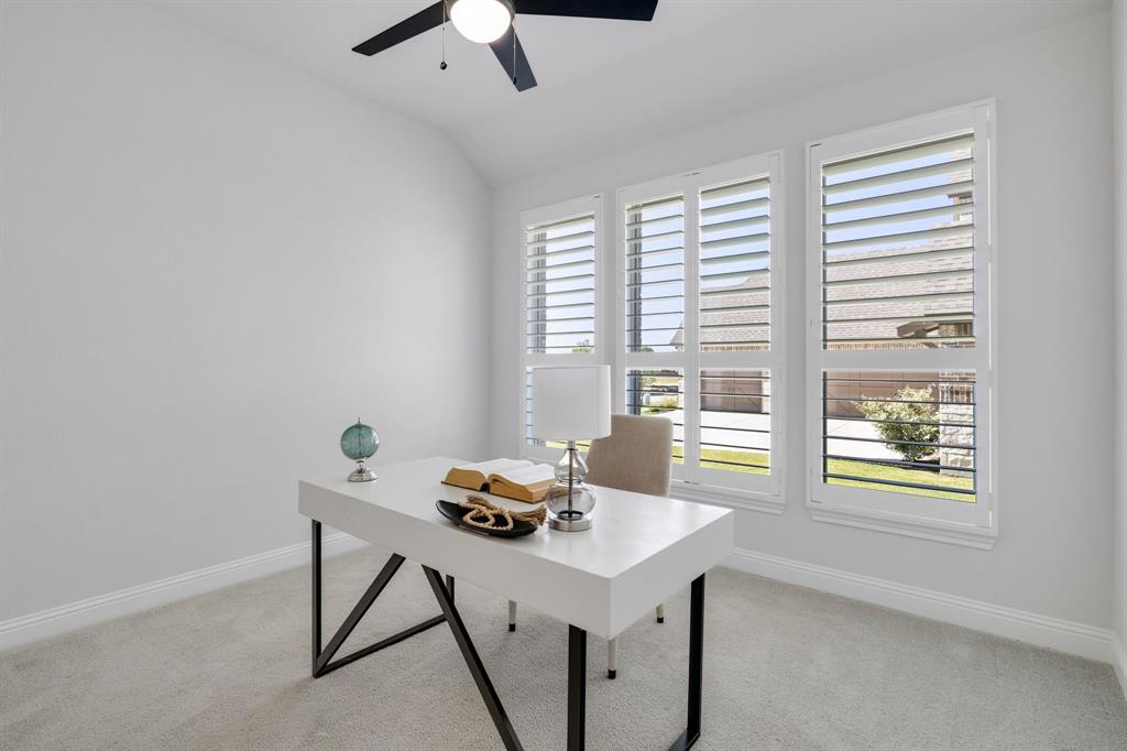 707 Soprano Drive Forney, TX 75126 - Photo 23 of 37 a view of a workspace with furniture and a window