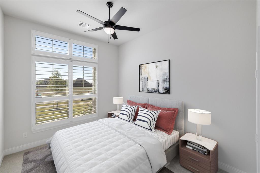 707 Soprano Drive Forney, TX 75126 - Photo 27 of 37 a bedroom with a large bed and a window