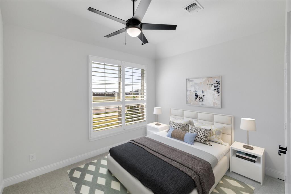 707 Soprano Drive Forney, TX 75126 - Photo 28 of 37 a bedroom with a bed and a window