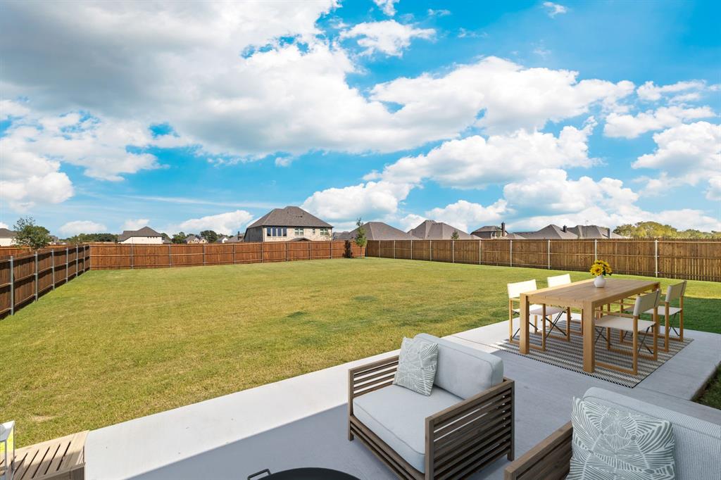 707 Soprano Drive Forney, TX 75126 - Photo 31 of 37 swimming view of a lake with couches chairs