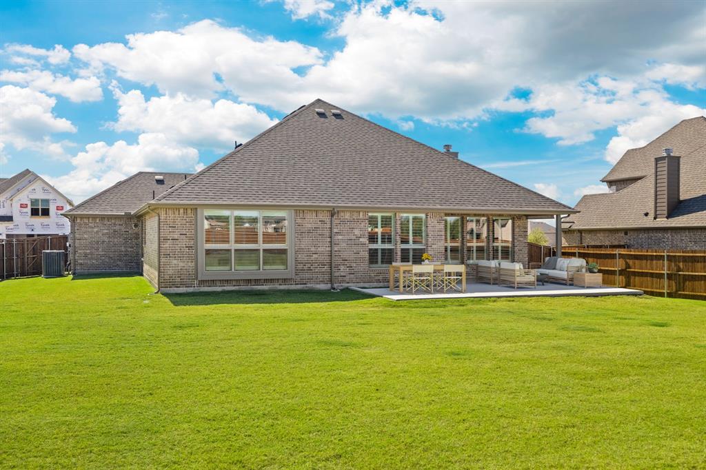 707 Soprano Drive Forney, TX 75126 - Photo 36 of 37 a view of a house with swimming pool having outdoor seating