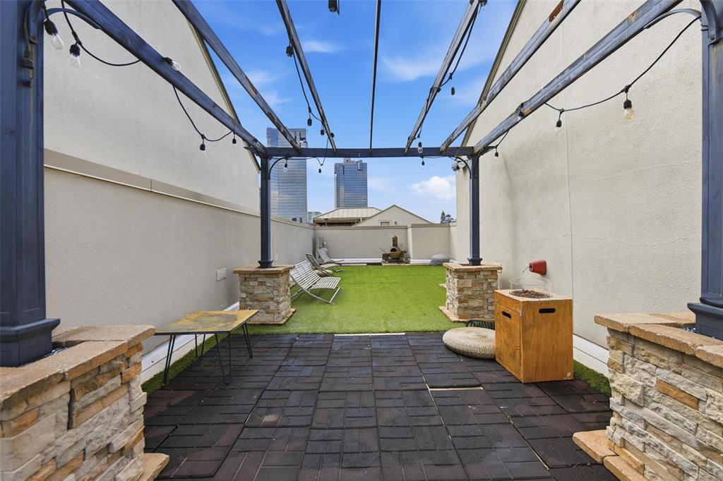 722 East 1st Street Fort Worth, TX 76102 - Photo 23 of 30 The possibilities are endless with thiis roof top deck with the backdrop being a breathtaking view of the Fort Worth skyline.