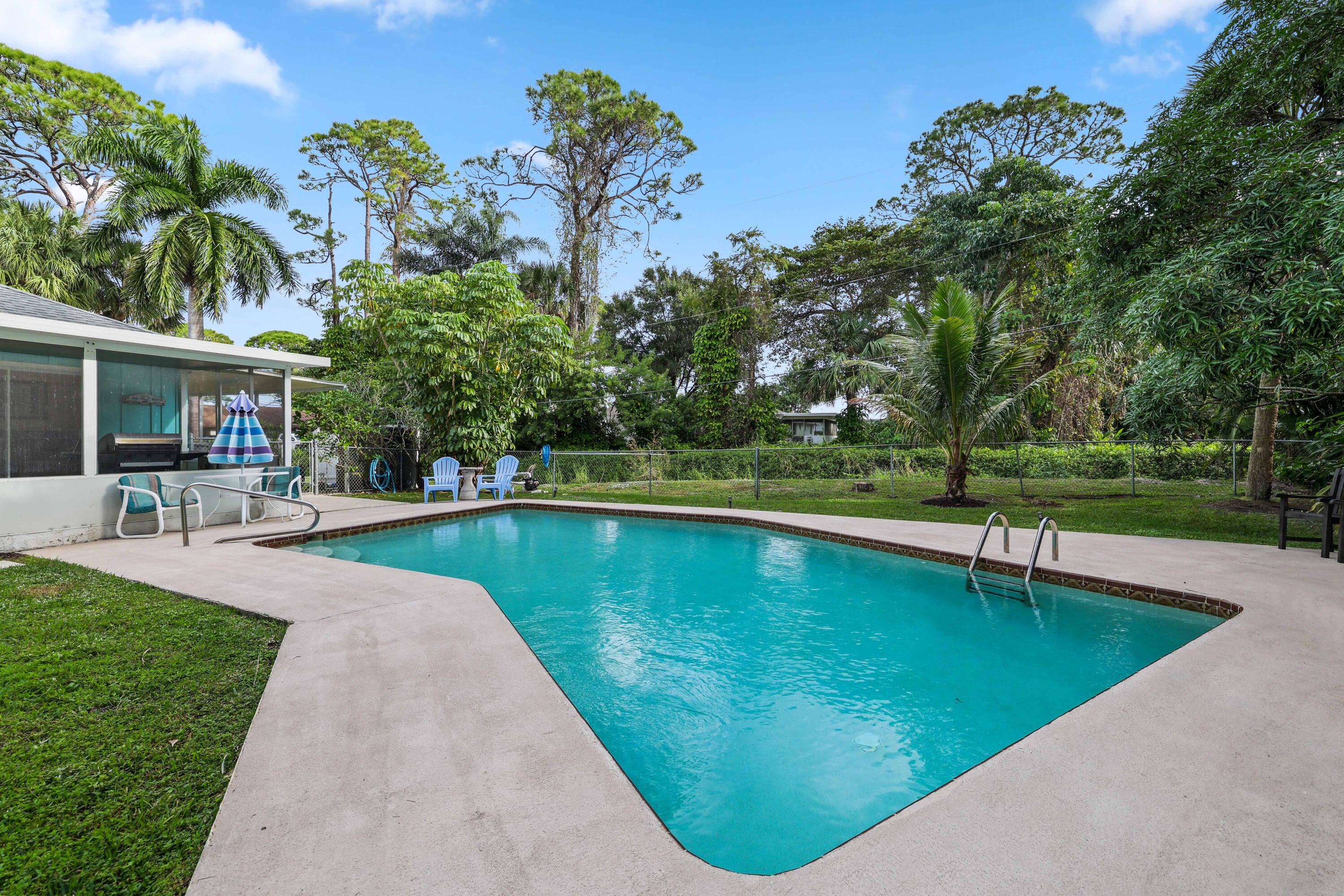 5554 Hibiscus Road Jupiter, FL 33458 - Photo 46 of 66 Pool West