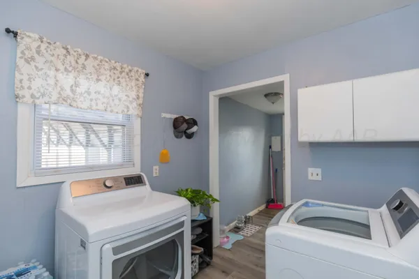 a room with a bed and furniture