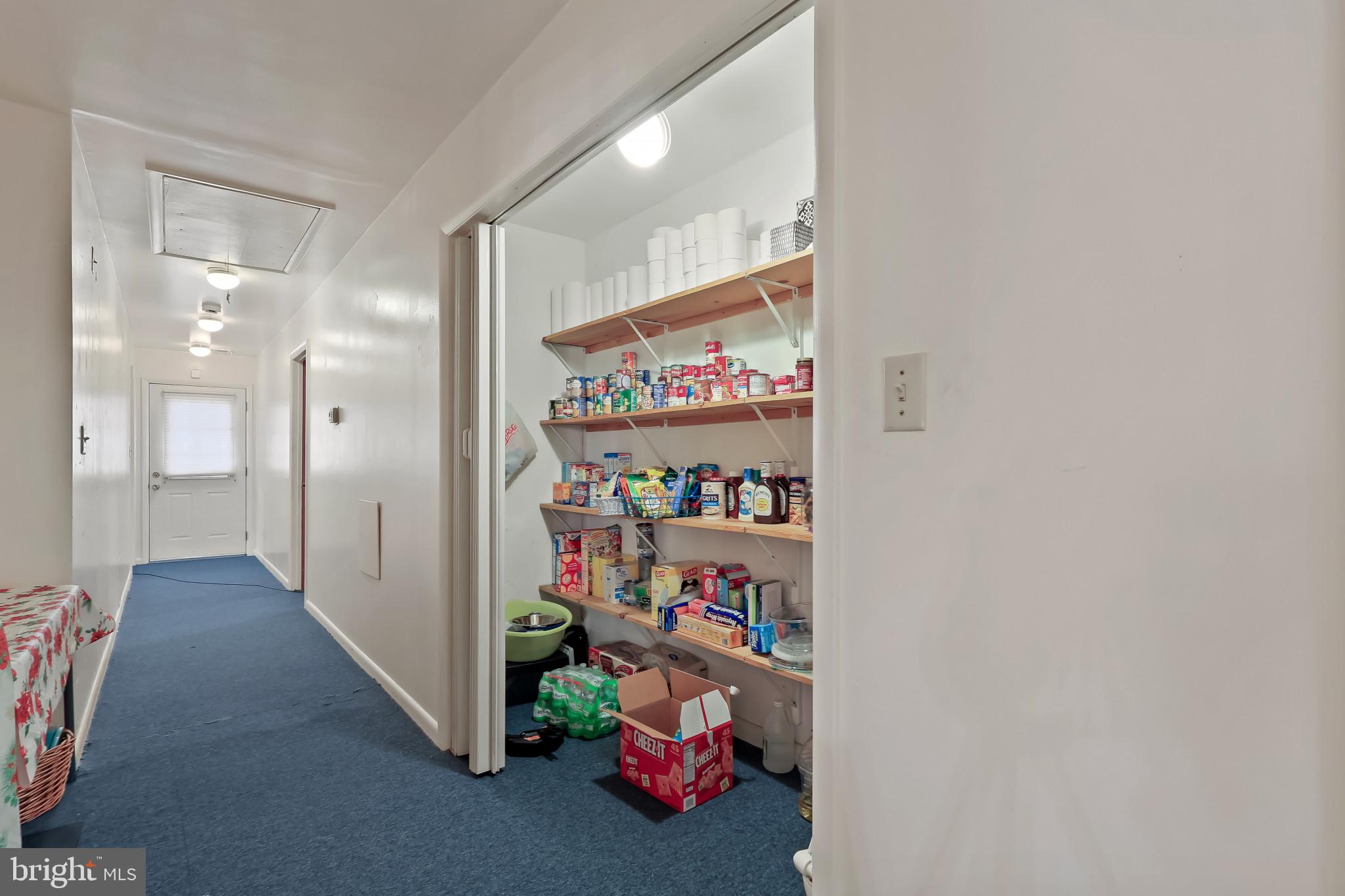 32 Ruby Street Springfield, NJ 07081 - Photo 11 of 31 a room with lots of different colored cloths