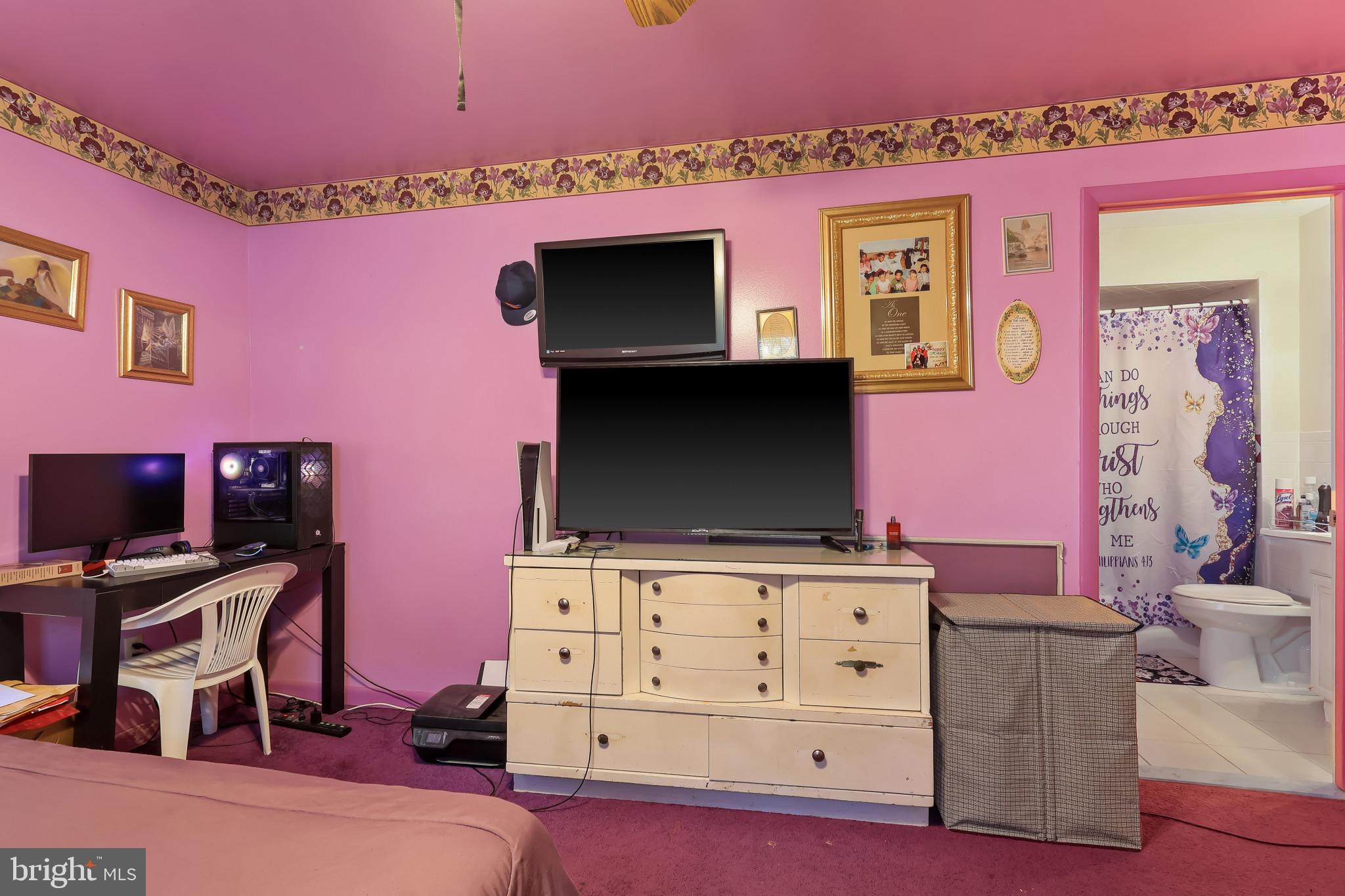 32 Ruby Street Springfield, NJ 07081 - Photo 13 of 31 a living room with furniture and a flat screen tv