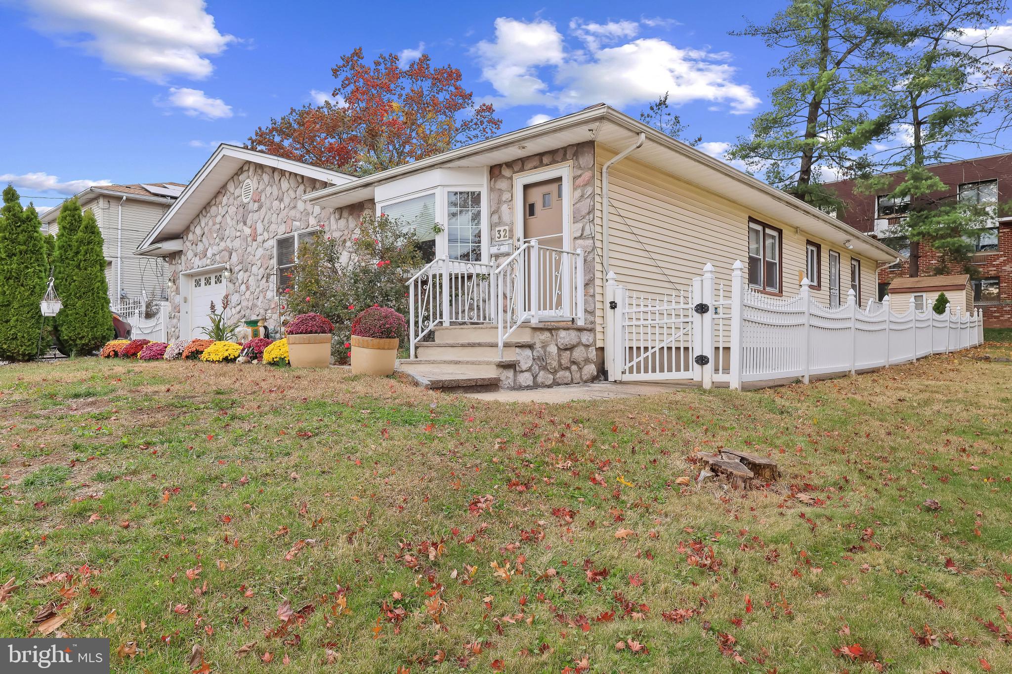32 Ruby Street Springfield, NJ 07081 - Photo 2 of 31 a front view of house with an outdoor space and seating