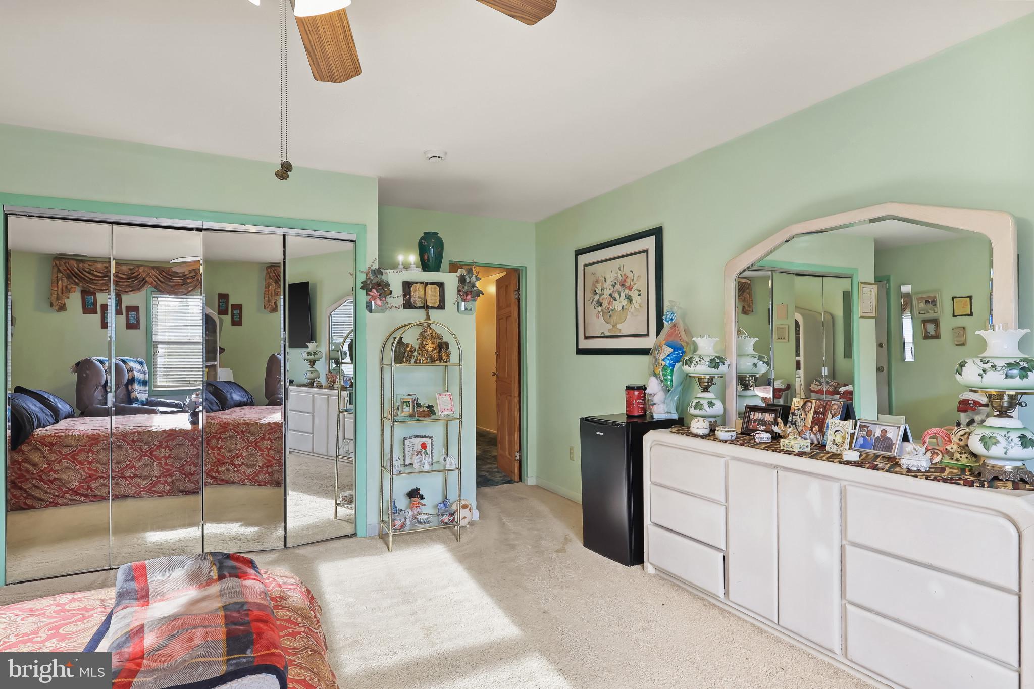 32 Ruby Street Springfield, NJ 07081 - Photo 21 of 31 a living room with furniture and a chandelier