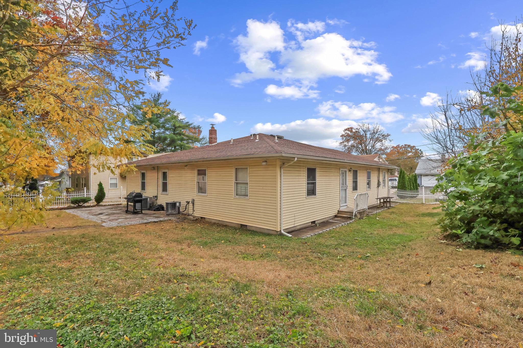 32 Ruby Street Springfield, NJ 07081 - Photo 30 of 31 a view of a house with a yard and large tree