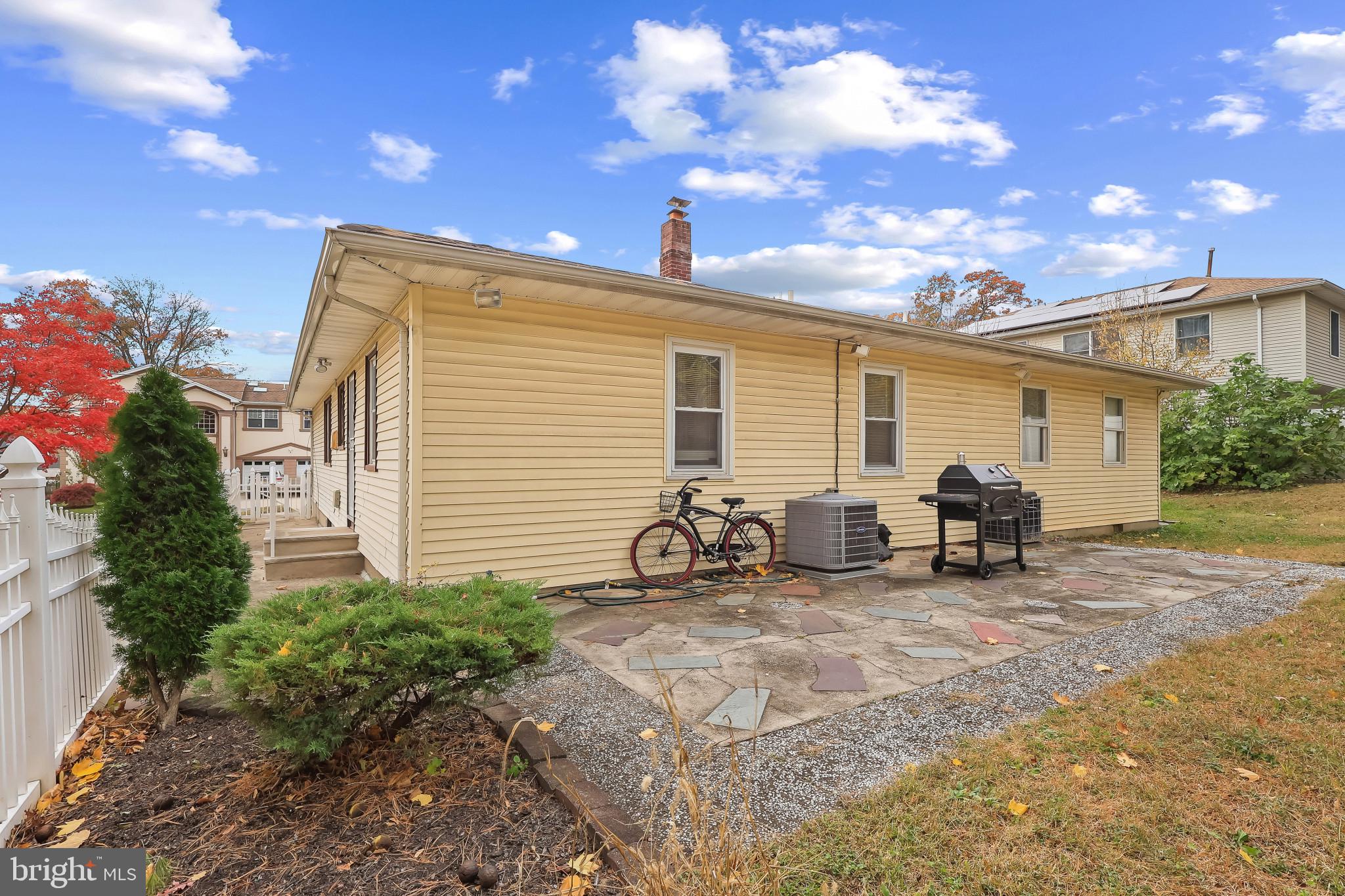 32 Ruby Street Springfield, NJ 07081 - Photo 31 of 31 a view of a patio with table and chairs and potted plants