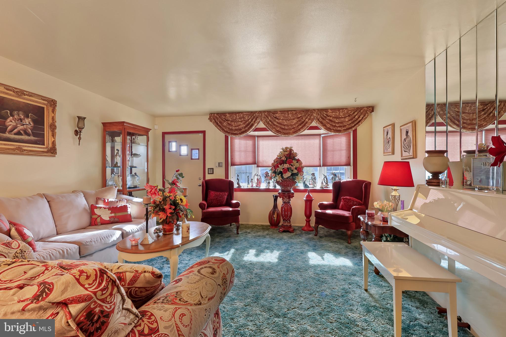 32 Ruby Street Springfield, NJ 07081 - Photo 6 of 31 a living room filled with furniture and a couch