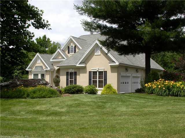 1 South Ridge Drive Bloomfield, CT 06002 - Photo 1 of 1 a front view of a house with a garden