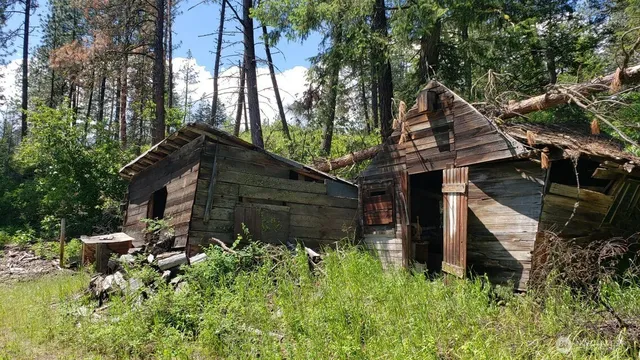 a backyard of a house with lots of green space